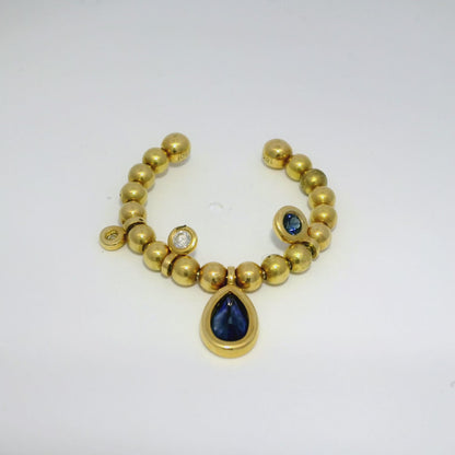 0.05CT Diamond and 0.60CT Blue Sapphire Ring 18K Yellow Gold